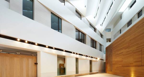 Interior corridor at Chetham’s School of Music, leading to academic classrooms and performance spaces.