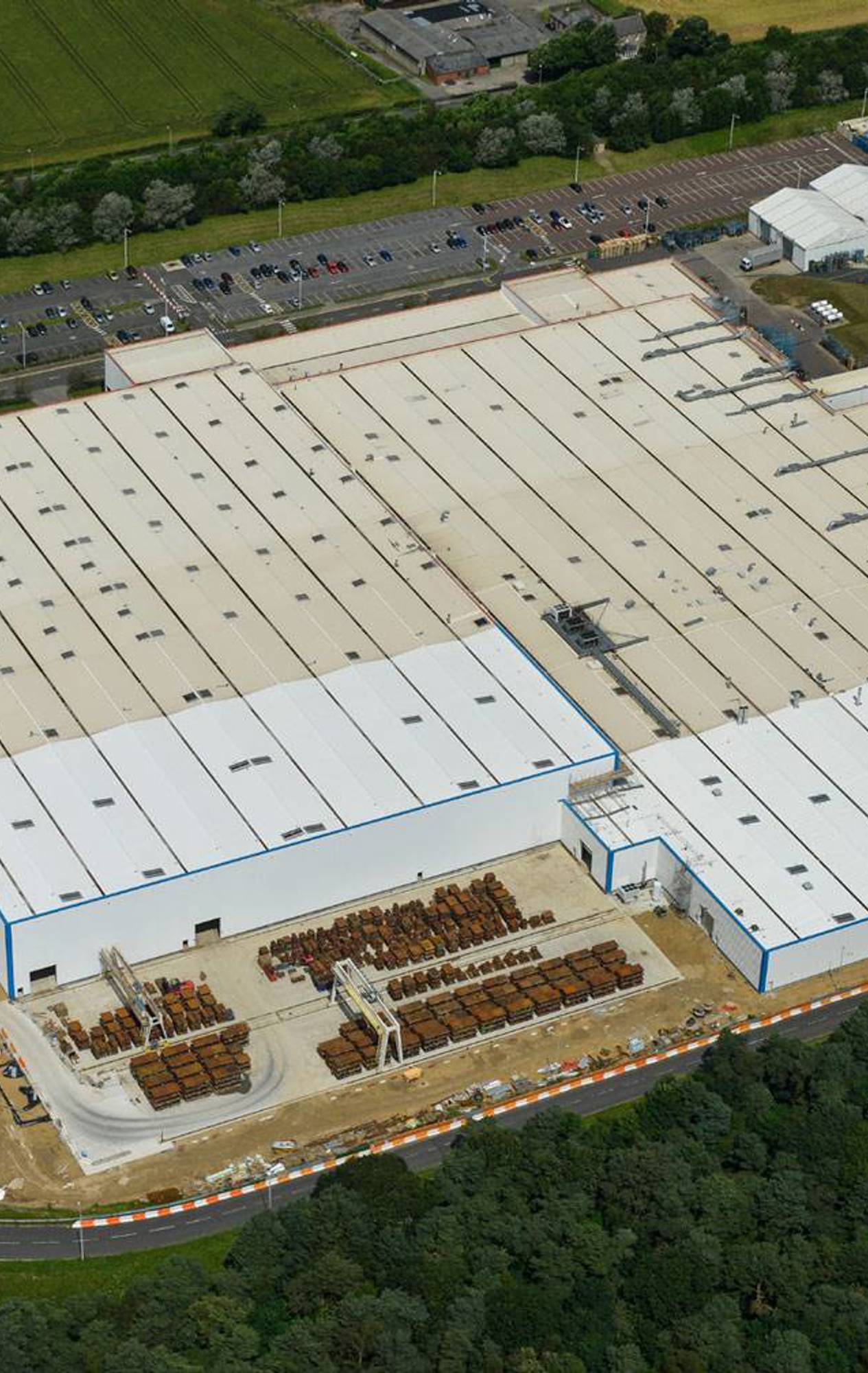 An aerial view of Unipres with surrounding landscapes visible