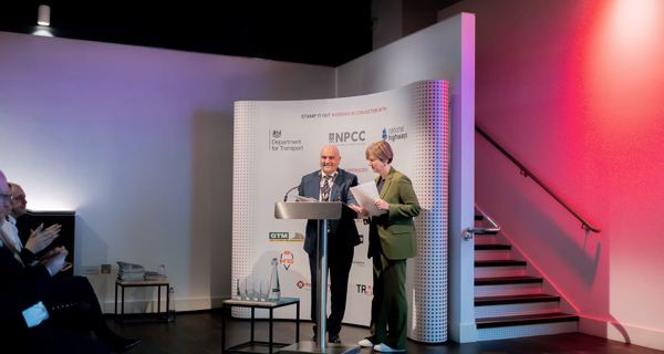 Lilian Greenwood MP delivering keynote speech on road worker safety next to Vip