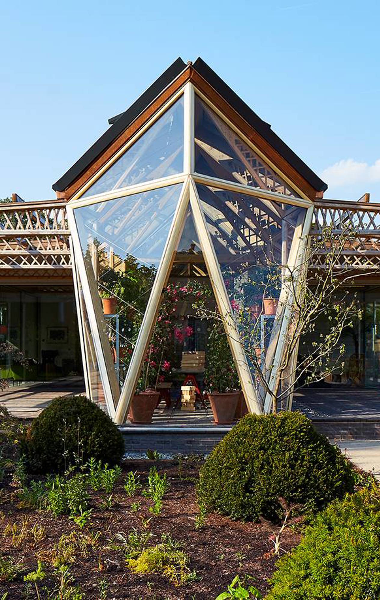 Garden view of Maggie’s Manchester, with lush greenery