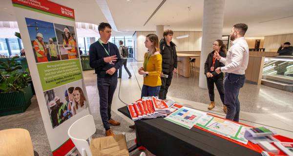 The garden at Maggie’s Southampton, filled with lush greenery, perennials, and trees such as birch, Scots pine, and rowan, creating a tranquil environment