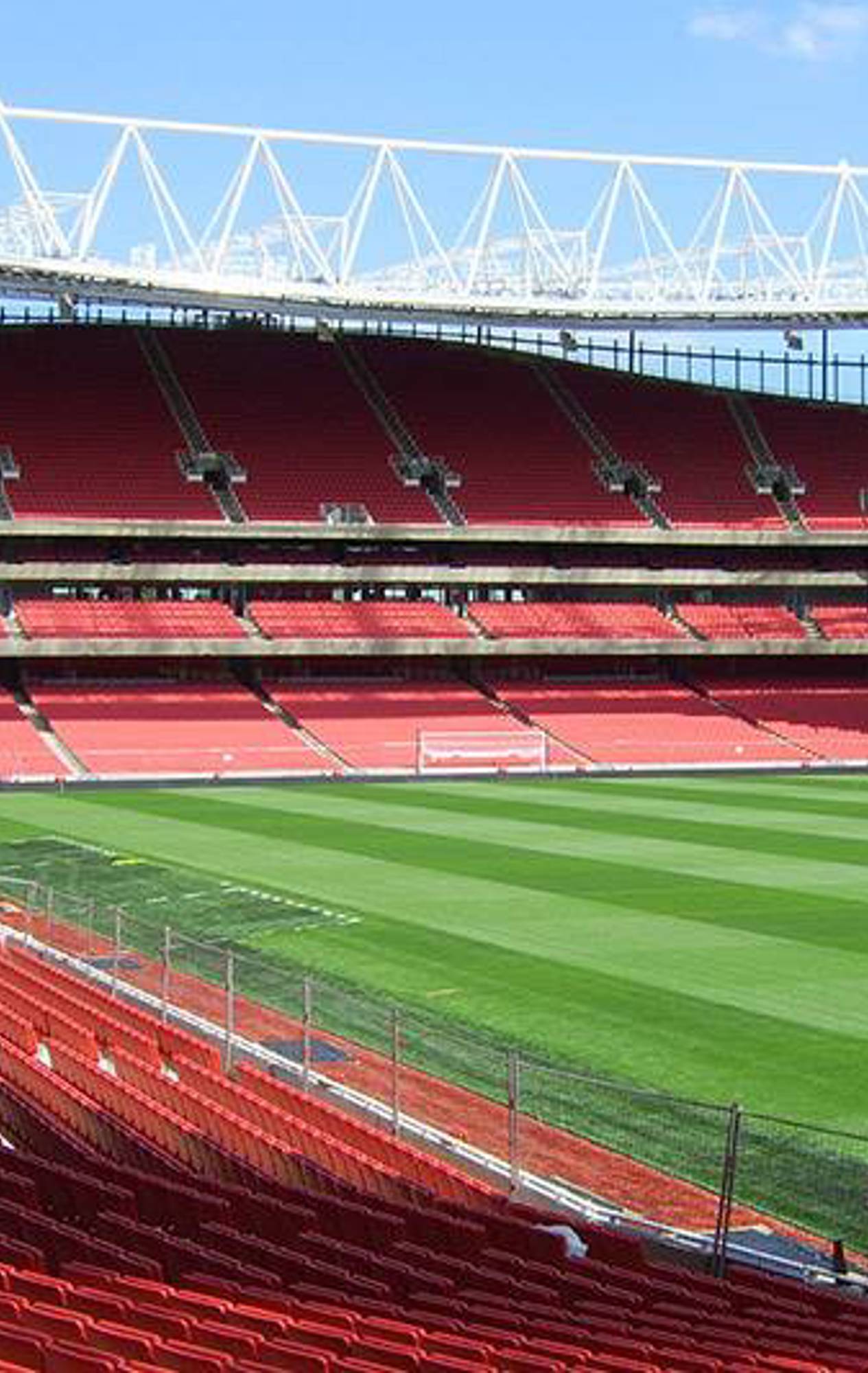 Panoramic view of Emirates Stadium, showcasing its vast seating capacity